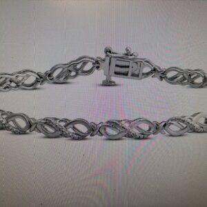 EUC  Diamond Infinity Link Bracelet 1/20 ct tw Sterling Silver 7.25"